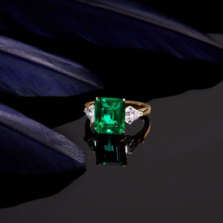 Emerald and diamond ring with yellow gold