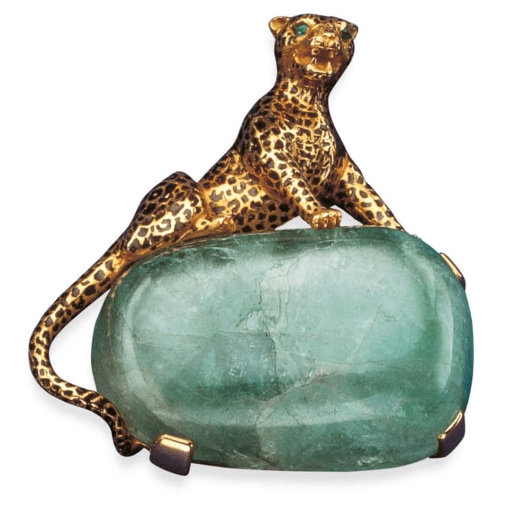Cartier brooch yellow and gold panther perched on a 116-carat cabochon-cut emerald