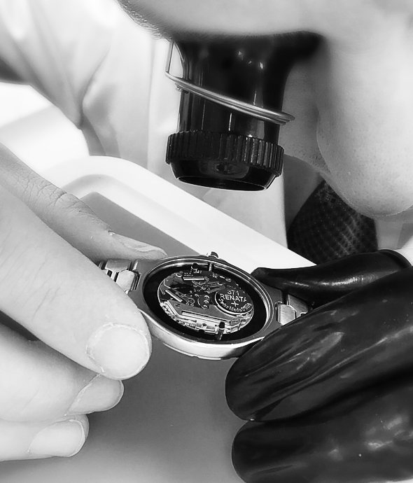 Man carrying out maintenance on a watch