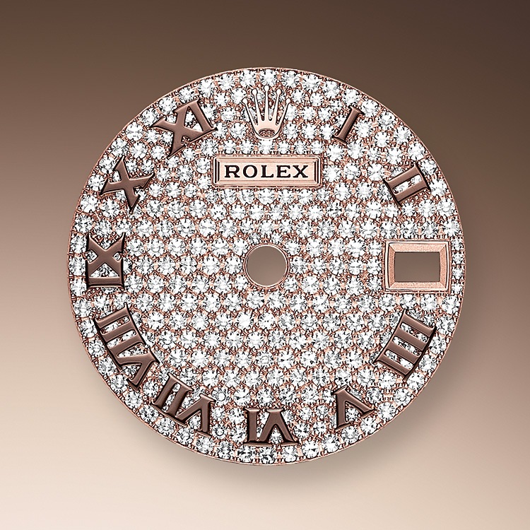 The diamond-paved dials are a sparkling symphony to enhance the watch and enchant the wearer. Gem-setters finely carve the precious metal to hand-shape the seat in which each gemstone will be perfectly lodged. Besides the intrinsic quality of the stones, several other criteria contribute to the beauty of Rolex gem-setting: the precise alignment of the height of the gems, their orientation and position, the regularity, strength and proportions of the setting as well as the intricate finishing of the metalwork.