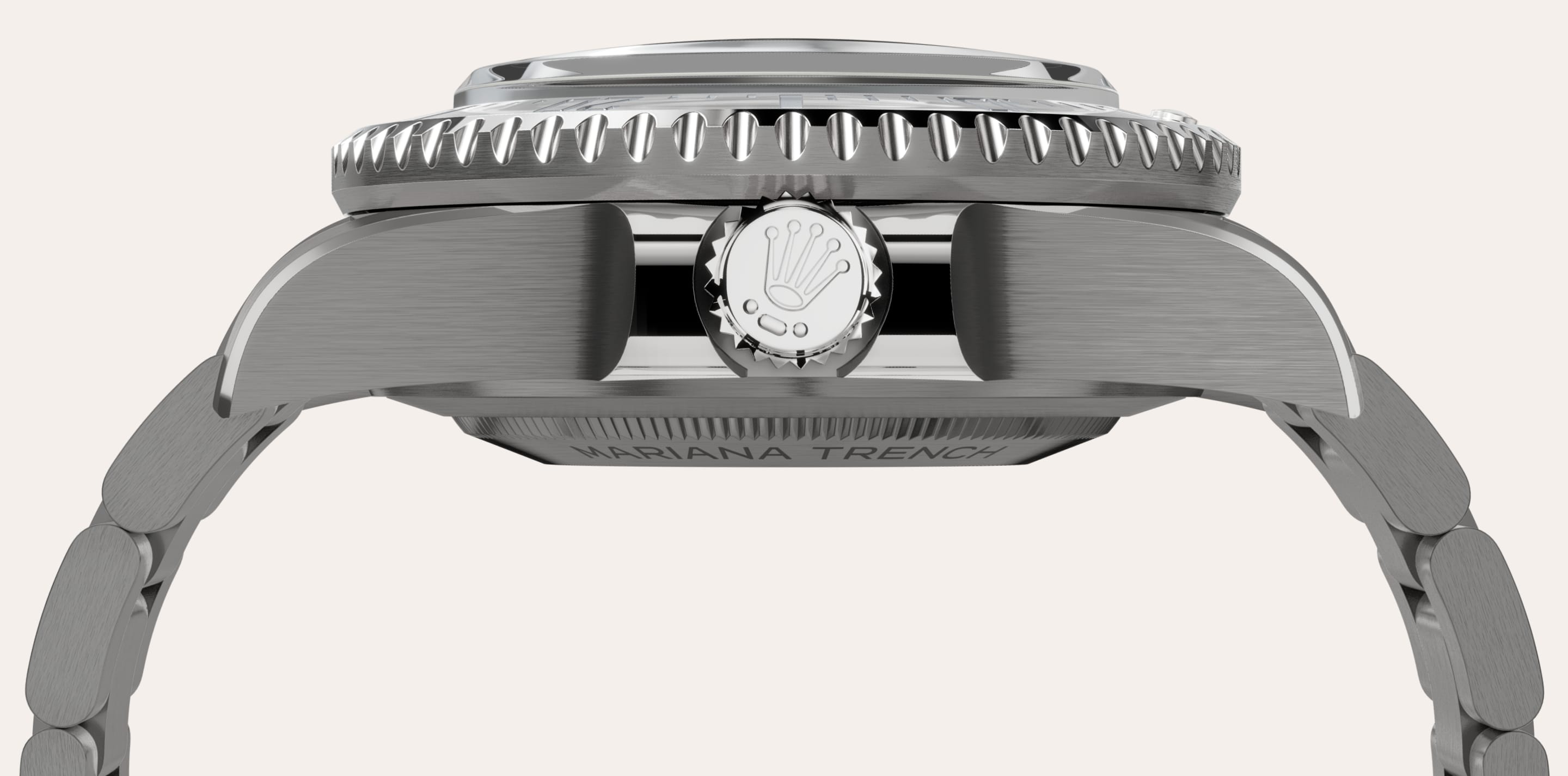 RLX titanium is a grade 5 titanium alloy selected by Rolex for its weightlessness and resistance to deformation and corrosion. Although insensitive to abyssal pressure, the experimental watch that accompanied James Cameron in the Mariana Trench still posed a wearability problem due to its weight, as it was made of 904L steel. The use of RLX titanium to create the case and bracelet of the Deepsea Challenge considerably lightened its weight: it is 30 per cent lighter than the experimental watch that inspired it. The watch also features a particularly visible grain in the satin finish on the bracelet and the case – with the exception of the crown guard. In order to highlight the curved profile of the lugs, the top edges have been chamfered and polished.