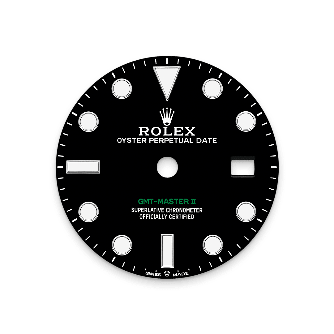 The black lacquer dial bears the inscription ‘GMT-Master II’ in green. This colour also features on the 24-hour hand. 

Like all Rolex Professional watches, the GMT-Master II offers exceptional legibility in all circumstances, and especially in the dark, thanks to its Chromalight display. The broad hands and hour markers in simple shapes – triangles, circles, rectangles – are filled with a luminescent material emitting a long-lasting glow.