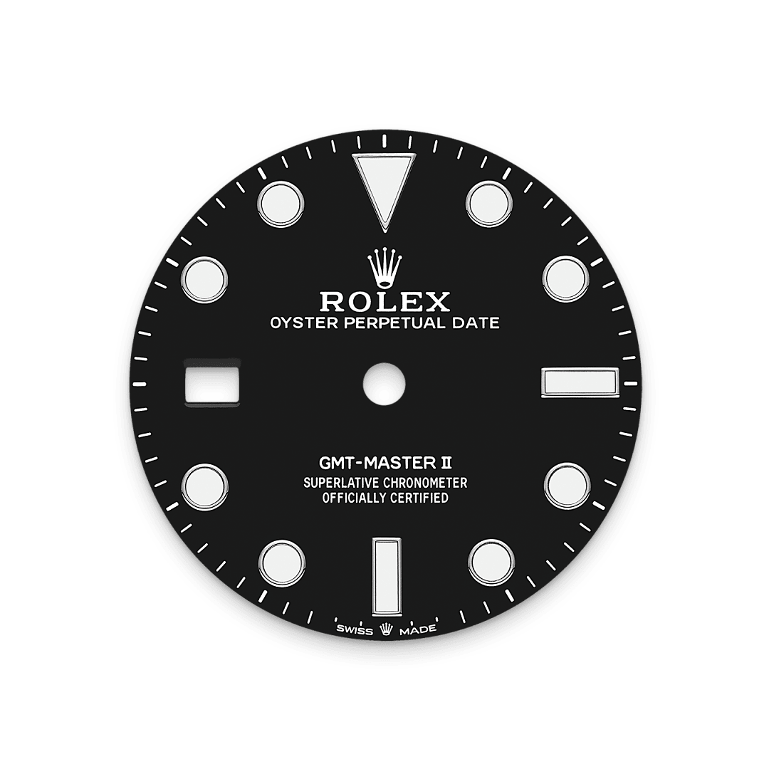 Like all Rolex Professional watches, the GMT-Master II offers exceptional legibility in all circumstances, and especially in the dark, thanks to its Chromalight display. The broad hands and hour markers in simple shapes – triangles, circles, rectangles – are filled with a luminescent material emitting a long-lasting glow.
On this novel version of the watch, the crown and crown guard are on the left side of the watch case. The date aperture and the Cyclops lens are at 9 o’clock.
