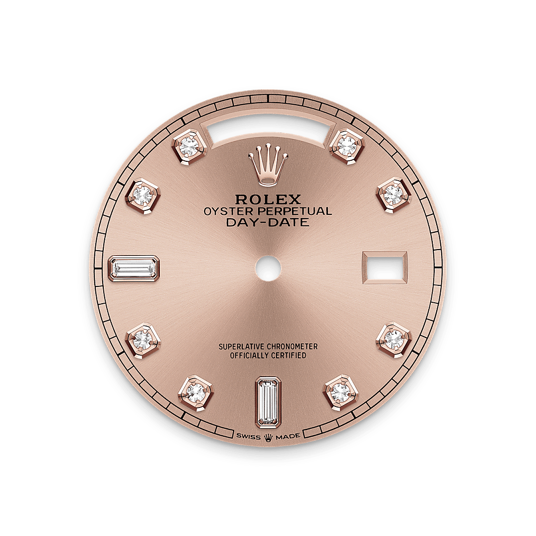 This dial features diamonds in 18 ct gold settings and baguette-cut diamonds at 6 and 9 o'clock. The sunray finish creates delicate light reflections on many dials in the Oyster Perpetual collection. It is obtained using masterful brushing techniques that create grooves running outwards from the centre of the dial. Light is diffused consistently along each engraving, creating a characteristic subtle glow that moves depending on the position of the wrist. Once the sunray finish has been completed, the dial colour is applied using Physical Vapour Deposition or electroplating. A light coat of varnish gives the dial its final look.