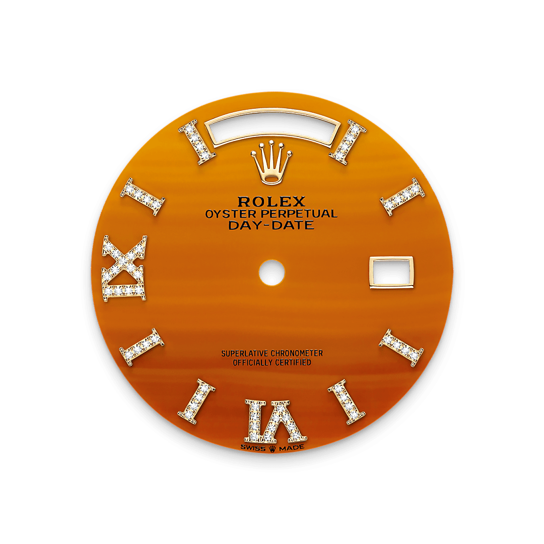 This dial features hour markers in 18 ct gold, set with 32 diamonds, and a Roman VI and IX in 18 ct gold, set with 24 diamonds. It is cut from carnelian, an orangey-colour stone typified by lines of varying shapes and sizes forming an artful cameo of patterns.The dial is the distinctive face of a Rolex watch, the feature most responsible for its identity and readability. Characterised by hour markers fashioned from gold to prevent tarnishing, every Rolex dial is designed and manufactured in-house, largely by hand to ensure perfection.