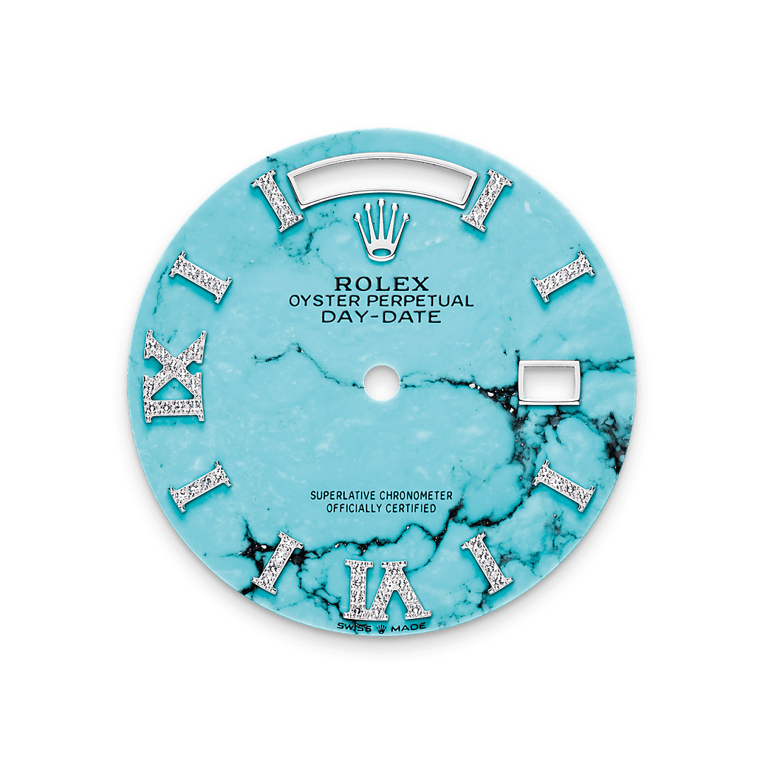 This dial features hour markers in 18 ct gold, set with 32 diamonds, and a Roman VI and IX in 18 ct gold, set with 24 diamonds. Only found in a few places on Earth, turquoise has been prized for thousands of years for its special hue. Rolex selects turquoise for the beauty of its structure and its characteristic, rare blue colour, because it marries perfectly with yellow and white gold. It is exclusively reserved for gold or platinum versions of the Day-Date 36.