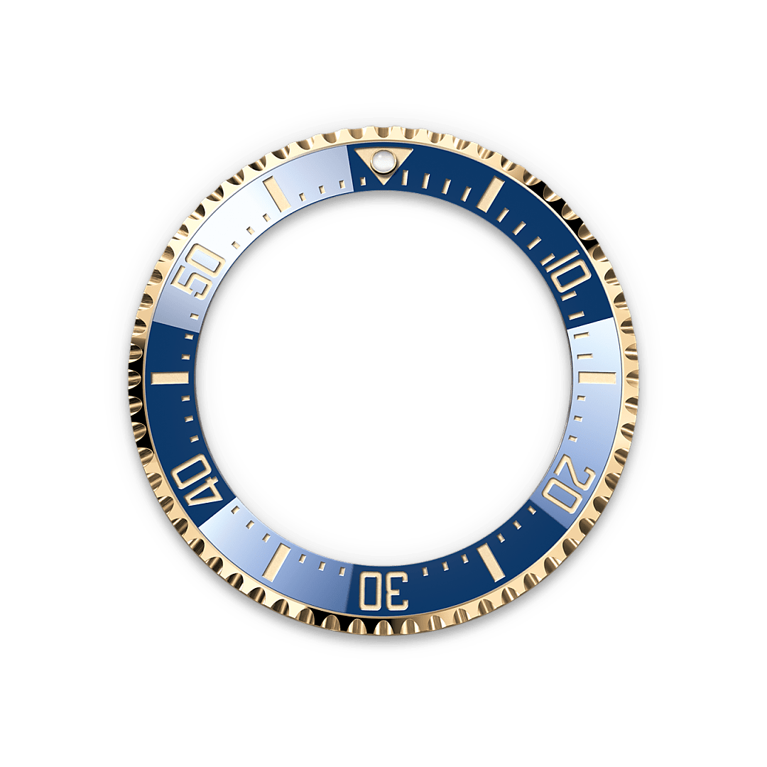 The 60-minute graduated, unidirectional rotatable bezel of the Rolex Deepsea enables divers to precisely and safely monitor their dive and decompression times. The triangular ‘zero’ marker of the graduation is visible in the dark thanks to an embedded capsule containing a luminescent material emitting a long-lasting blue glow. The graduation on the bezel is coated via PVD (Physical Vapour Deposition) with a thin layer of yellow gold.

The blues found in the compression ring, the dial and the Cerachrom bezel insert combine to create a subtle oceanic palette that is accentuated by the 18 ct yellow gold of the case and the Oyster bracelet.