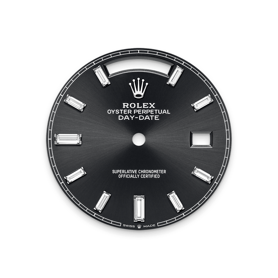 This dial features 10 baguette-cut diamonds. The sunray finish creates delicate light reflections on many dials in the Oyster Perpetual collection. It is obtained using masterful brushing techniques that create grooves running outwards from the centre of the dial. Light is diffused consistently along each engraving, creating a characteristic subtle glow that moves depending on the position of the wrist. Once the sunray finish has been completed, the dial colour is applied using Physical Vapour Deposition or electroplating. A light coat of varnish gives the dial its final look.