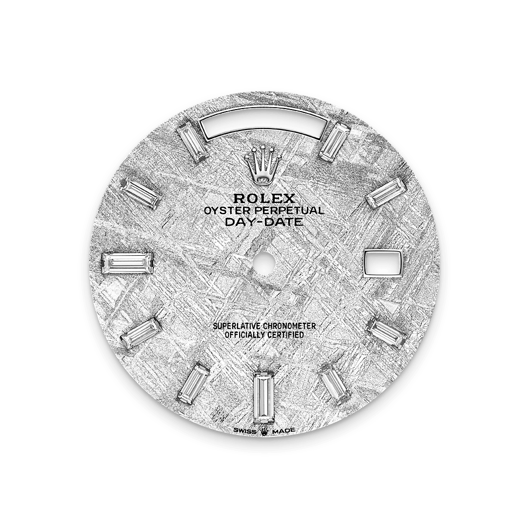 This dial features 10 baguette-cut diamonds. Formed in the far reaches of the solar system, metallic meteorite comes from an asteroid that exploded millions of years ago. On the voyage between planets, fragments of this natural extraterrestrial material, primarily composed of iron and nickel, cool by a few degrees Celsius every million years, creating unique, distinctive crystallization within the material that is impossible to recreate on Earth. Metallic meteorite is rare and challenging to work with, but once it is cut into thin sections and a chemical treatment is applied, the great beauty 