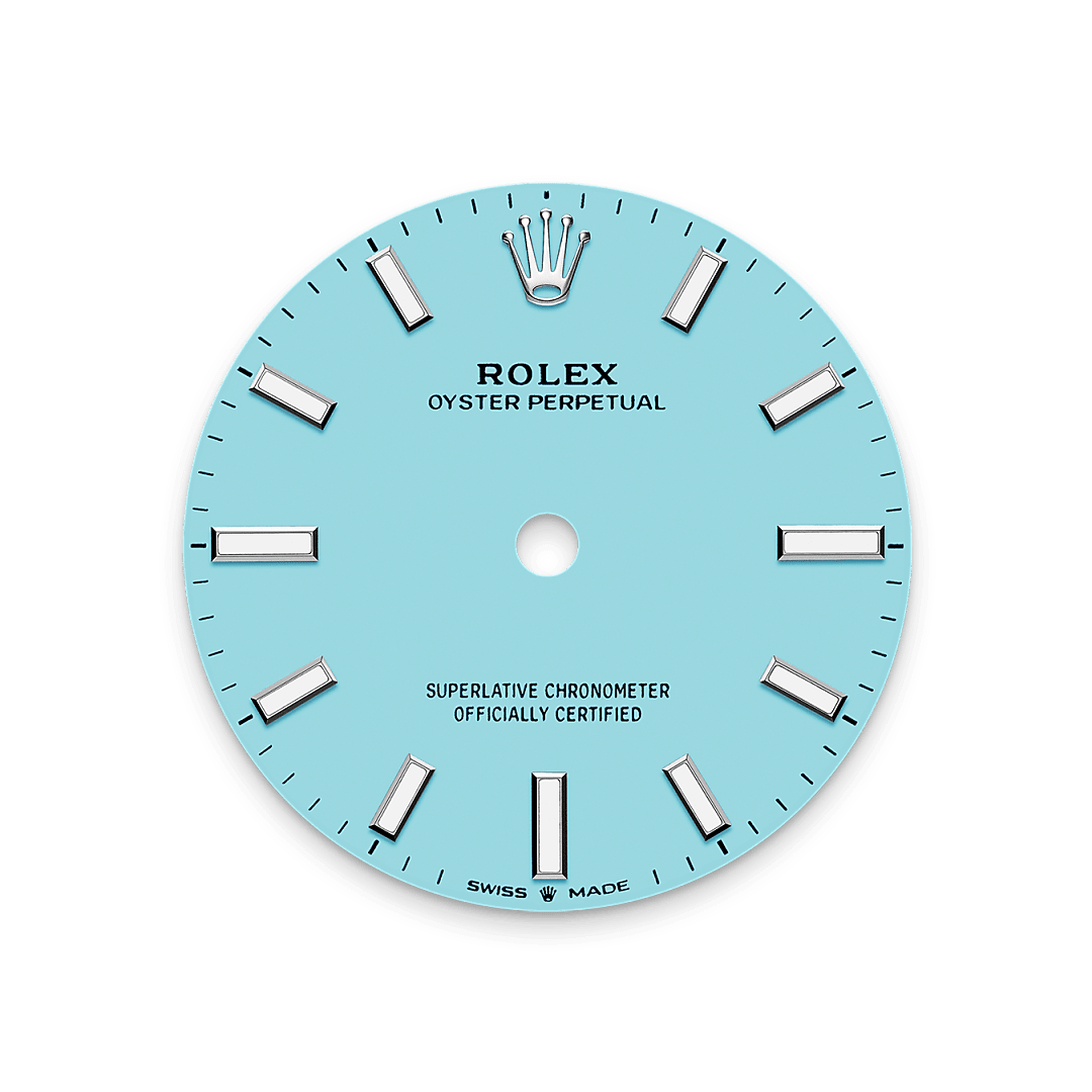 This bold, vivid tone is thanks to exceptional in-house expertise at Rolex, where craftsmanship rhymes with high technology. The colours created for the Oyster Perpetual range start life as a lacquer, which must be meticulously applied in a controlled-atmosphere environment to avoid dust and other contamination. The brass plate of the dial base receives layer upon layer of lacquer, six in all, to form a regular, uniform surface. The last step is varnishing and polishing to bring out the full brilliance and depth of colour. The various inscriptions are then pad printed, and the hour markers and crown riveted by hand. The dial, gleaming in its perfection, is all set to take its place on top of the movement at the watch assembly phase.