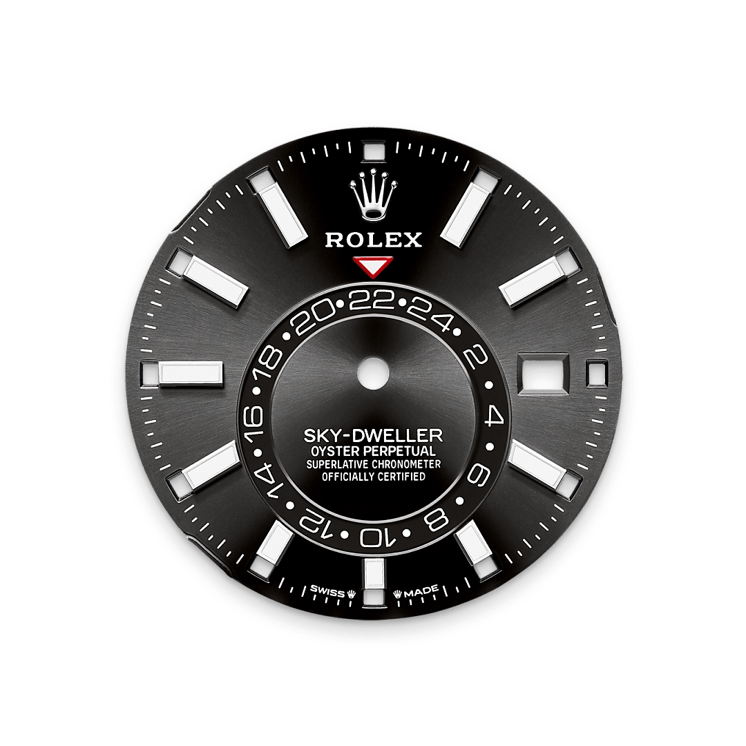 A fixed inverted red triangle on the dial points to the chosen reference time – the time at home or at the traveller’s usual workplace – on the off-centre 24-hour disc. At a glance, this 24-hour display clearly distinguishes daytime hours from night-time hours in the other time zone. The dials now feature rectangular index hour markers and longer hands, as well as a Chromalight display with long-lasting luminescence, which enhances legibility. 
A deep red rectangle in one of the 12 windows around the dial indicates the current month, a striking characteristic of the Saros annual calendar. This ingenious mechanism simplifies life for the wearer of the watch, who no longer needs to think about adjusting the date at the end of a 30-day month. The annual calendar displays the correct date through the year. Only one adjustment is needed – on 1 March (February having only 28 or 29 days). The date is connected to local time and automatically changes according to the traveller’s local time zone.
