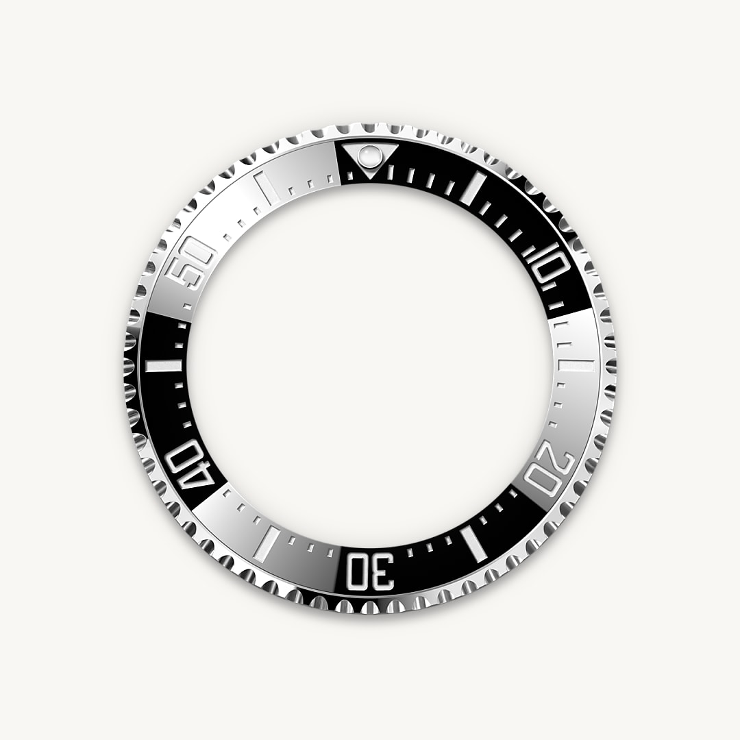 The 60-minute graduated, unidirectional rotatable bezel of the Sea-Dweller enables divers to precisely and safely monitor their dive and decompression times. It is equipped with a patented black Cerachrom bezel insert manufactured by Rolex in a virtually scratchproof ceramic whose colour is unaffected by ultraviolet rays. The graduation is coated via PVD (Physical Vapour Deposition) with a thin layer of platinum. The dial features large Chromalight hour markers and hands, filled with luminescent material that emits a long-lasting blue glow for excellent legibility in dark conditions.