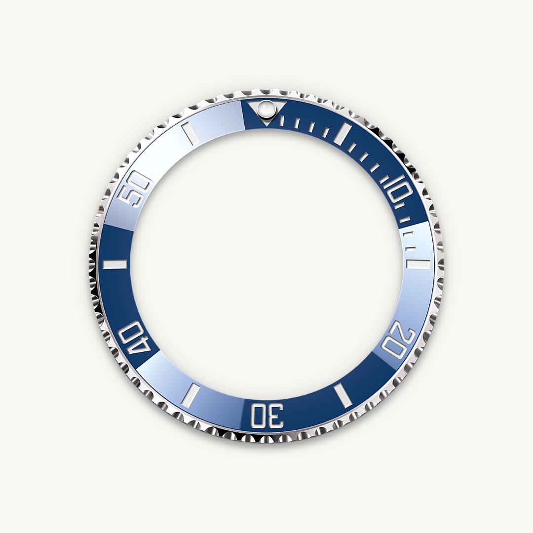 The Submariner's rotatable bezel is a key functionality of the watch. Its 60-minute graduations allow a diver to accurately and safely monitor diving time and decompression stops. Manufactured by Rolex from a hard, corrosion-resistant ceramic, the Cerachrom bezel insert is virtually scratchproof. A luminescent capsule on the zero marker ensures legibility, no matter how dark the environment. The bezel’s knurled edge is carefully designed to offer excellent grip under water, even with gloves.