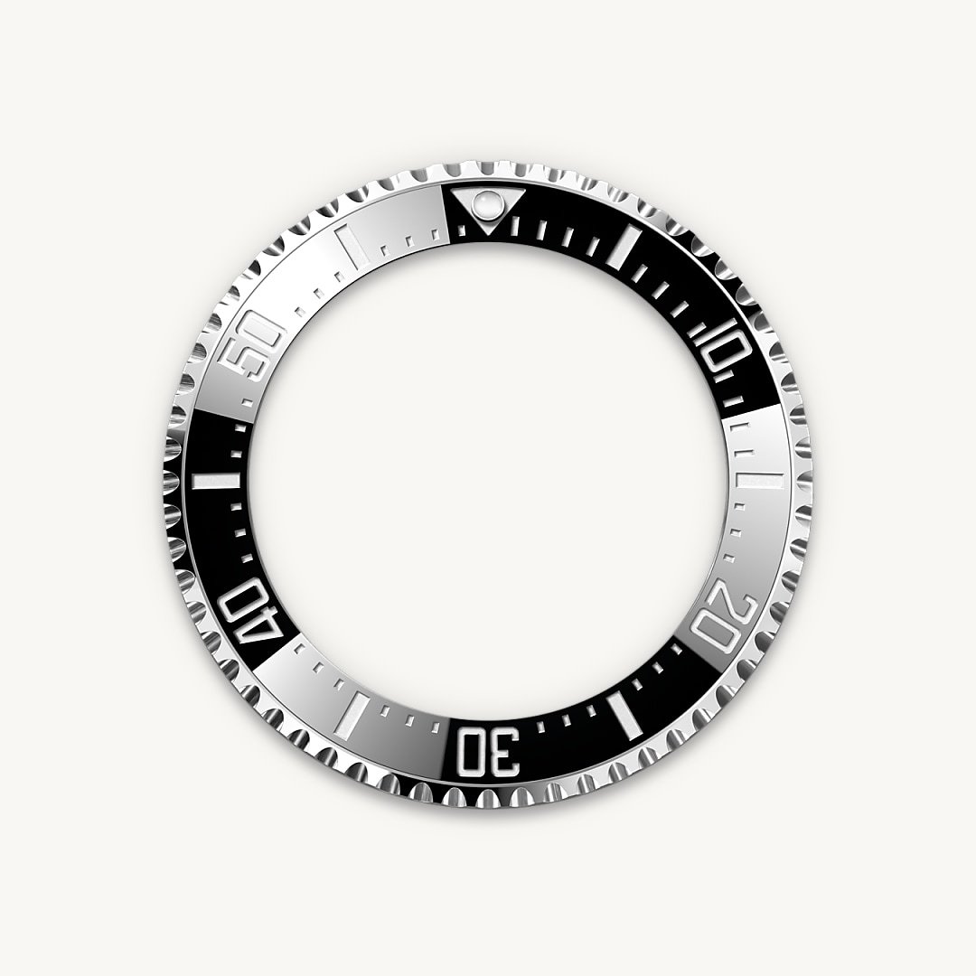 The 60-minute graduated, unidirectional rotatable bezel of the Rolex Deepsea enables divers to precisely and safely monitor their dive and decompression times. It is equipped with a patented black Cerachrom bezel insert manufactured by Rolex in a virtually scratchproof ceramic whose colour is unaffected by ultraviolet rays. The graduation is coated via PVD (Physical Vapour Deposition) with a thin layer of platinum. The dial features large Chromalight hour markers and hands, filled with luminescent material that emits a long-lasting blue glow for excellent legibility in dark conditions.