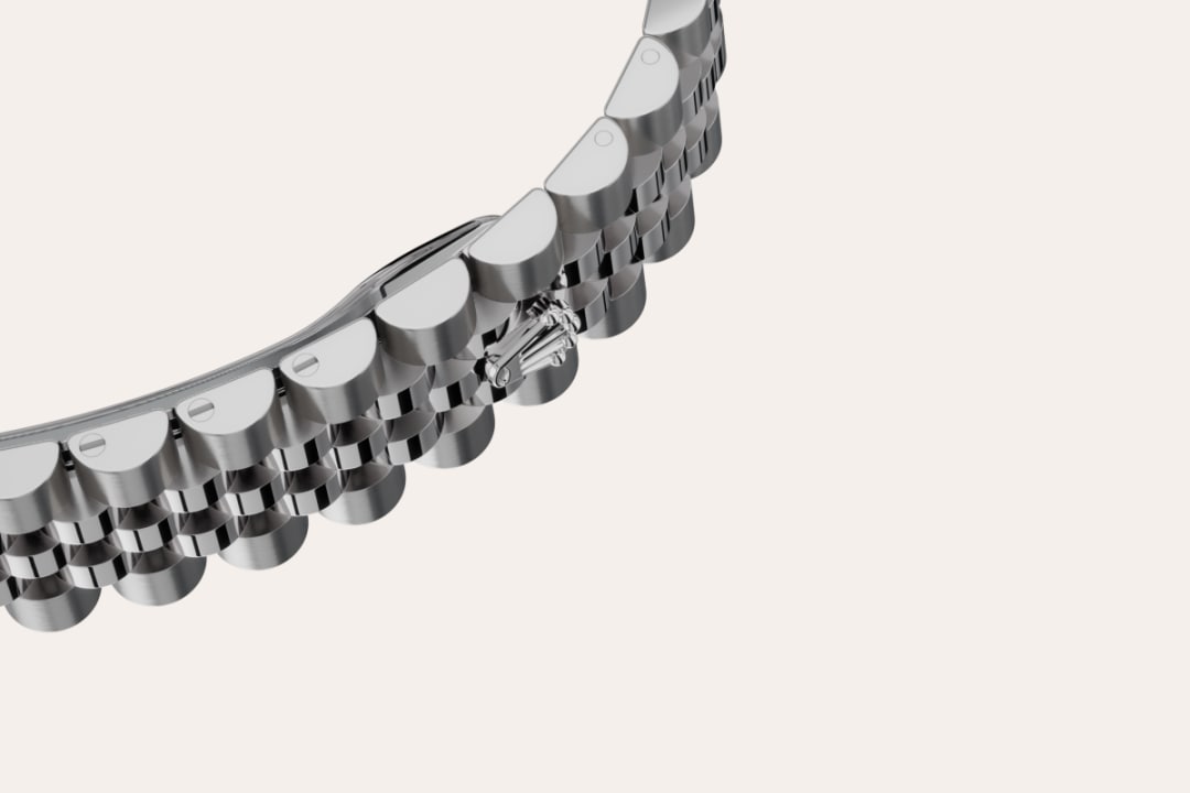 The design, development and production of Rolex bracelets and clasps, as well as the stringent tests they face, involve advanced high technology. And, as with all the components of the watch, aesthetic controls by the human eye guarantee impeccable beauty.  The Jubilee, a supple and comfortable five-piece link metal bracelet, was designed and made especially for the launch of the Oyster Perpetual Datejust in 1945.