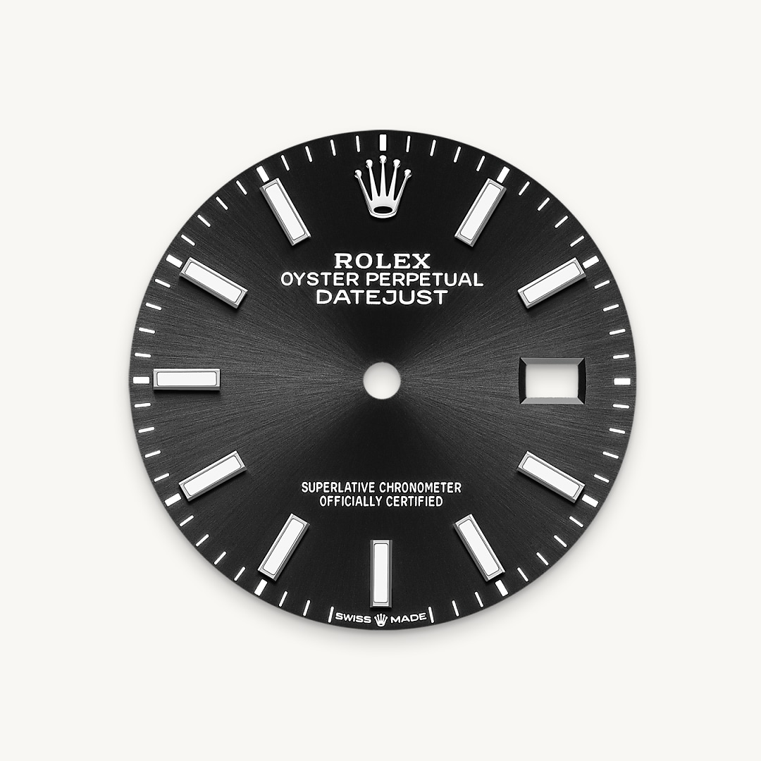The sunray finish creates delicate light reflections on many dials in the Oyster Perpetual collection. It is obtained using masterful brushing techniques that create grooves running outwards from the centre of the dial. Light is diffused consistently along each engraving, creating a characteristic subtle glow that moves depending on the position of the wrist. Once the sunray finish has been completed, the dial colour is applied using Physical Vapour Deposition or electroplating. A light coat of varnish gives the dial its final look.