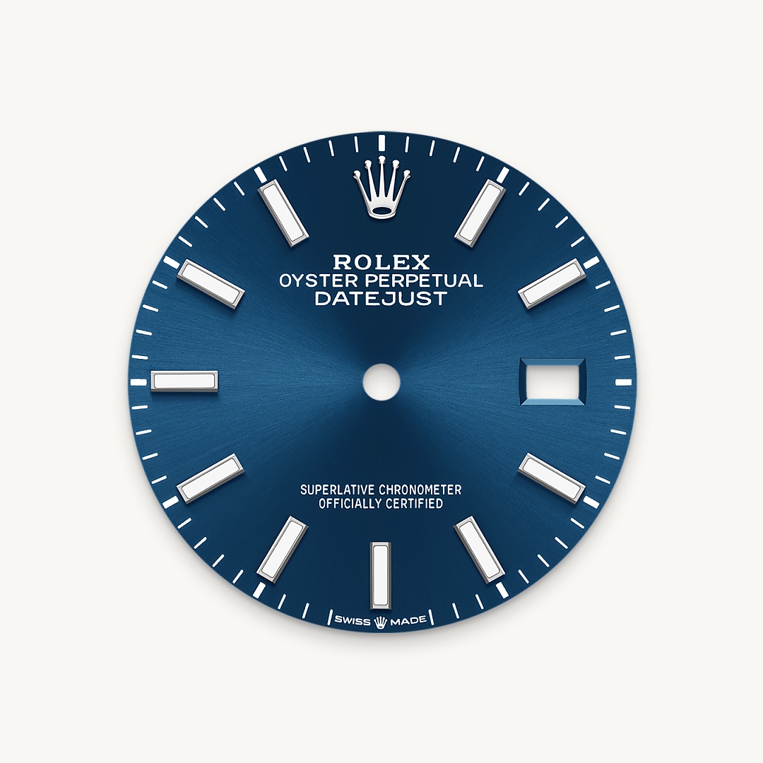 The sunray finish creates delicate light reflections on many dials in the Oyster Perpetual collection. It is obtained using masterful brushing techniques that create grooves running outwards from the centre of the dial. Light is diffused consistently along each engraving, creating a characteristic subtle glow that moves depending on the position of the wrist. Once the sunray finish has been completed, the dial colour is applied using Physical Vapour Deposition or electroplating. A light coat of varnish gives the dial its final look.