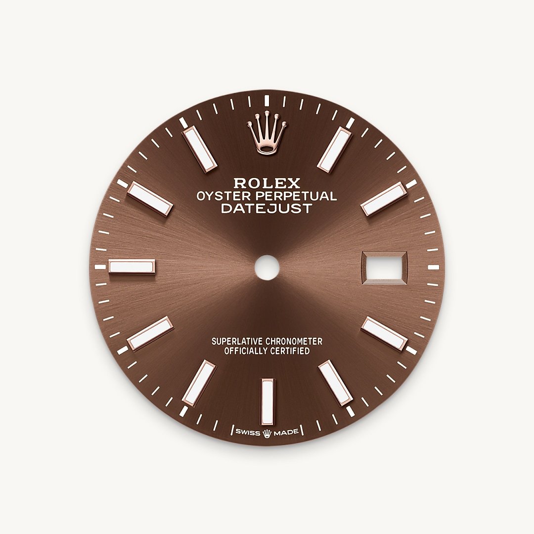 The sunray finish creates delicate light reflections on many dials in the Oyster Perpetual collection. It is obtained using masterful brushing techniques that create grooves running outwards from the centre of the dial. Light is diffused consistently along each engraving, creating a characteristic subtle glow that moves depending on the position of the wrist. Once the sunray finish has been completed, the dial colour is applied using Physical Vapour Deposition or electroplating. A light coat of varnish gives the dial its final look.
