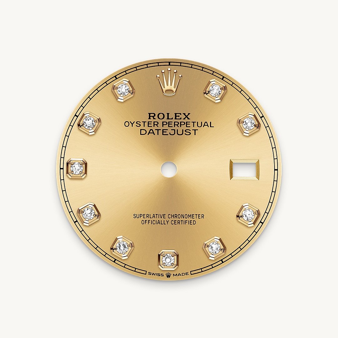 This dial features diamonds in 18 ct gold settings. The sunray finish creates delicate light reflections on many dials in the Oyster Perpetual collection. It is obtained using masterful brushing techniques that create grooves running outwards from the centre of the dial. Light is diffused consistently along each engraving, creating a characteristic subtle glow that moves depending on the position of the wrist. Once the sunray finish has been completed, the dial colour is applied using Physical Vapour Deposition or electroplating. A light coat of varnish gives the dial its final look.