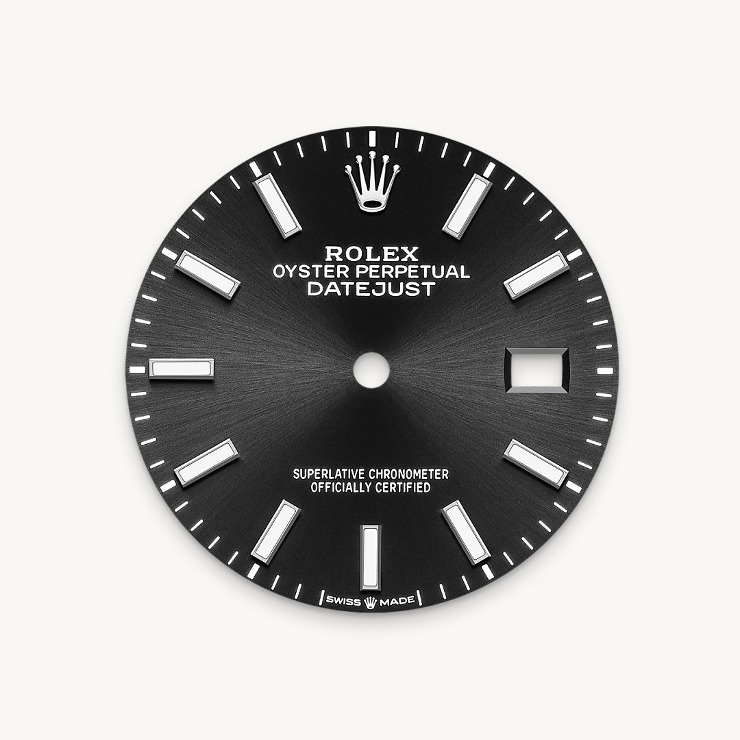 The sunray finish creates delicate light reflections on many dials in the Oyster Perpetual collection. It is obtained using masterful brushing techniques that create grooves running outwards from the centre of the dial. Light is diffused consistently along each engraving, creating a characteristic subtle glow that moves depending on the position of the wrist. Once the sunray finish has been completed, the dial colour is applied using Physical Vapour Deposition or electroplating. A light coat of varnish gives the dial its final look.