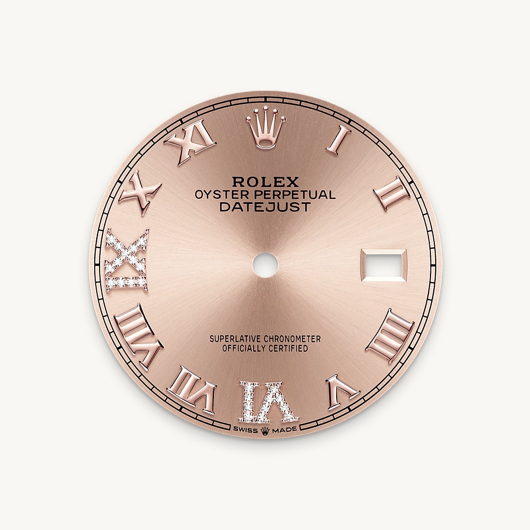 This dial features a Roman VI and IX in 18 ct gold, set with 24 diamonds. The sunray finish creates delicate light reflections on many dials in the Oyster Perpetual collection. It is obtained using masterful brushing techniques that create grooves running outwards from the centre of the dial. Light is diffused consistently along each engraving, creating a characteristic subtle glow that moves depending on the position of the wrist. Once the sunray finish has been completed, the dial colour is applied using Physical Vapour Deposition or electroplating. A light coat of varnish gives the dial its final look.