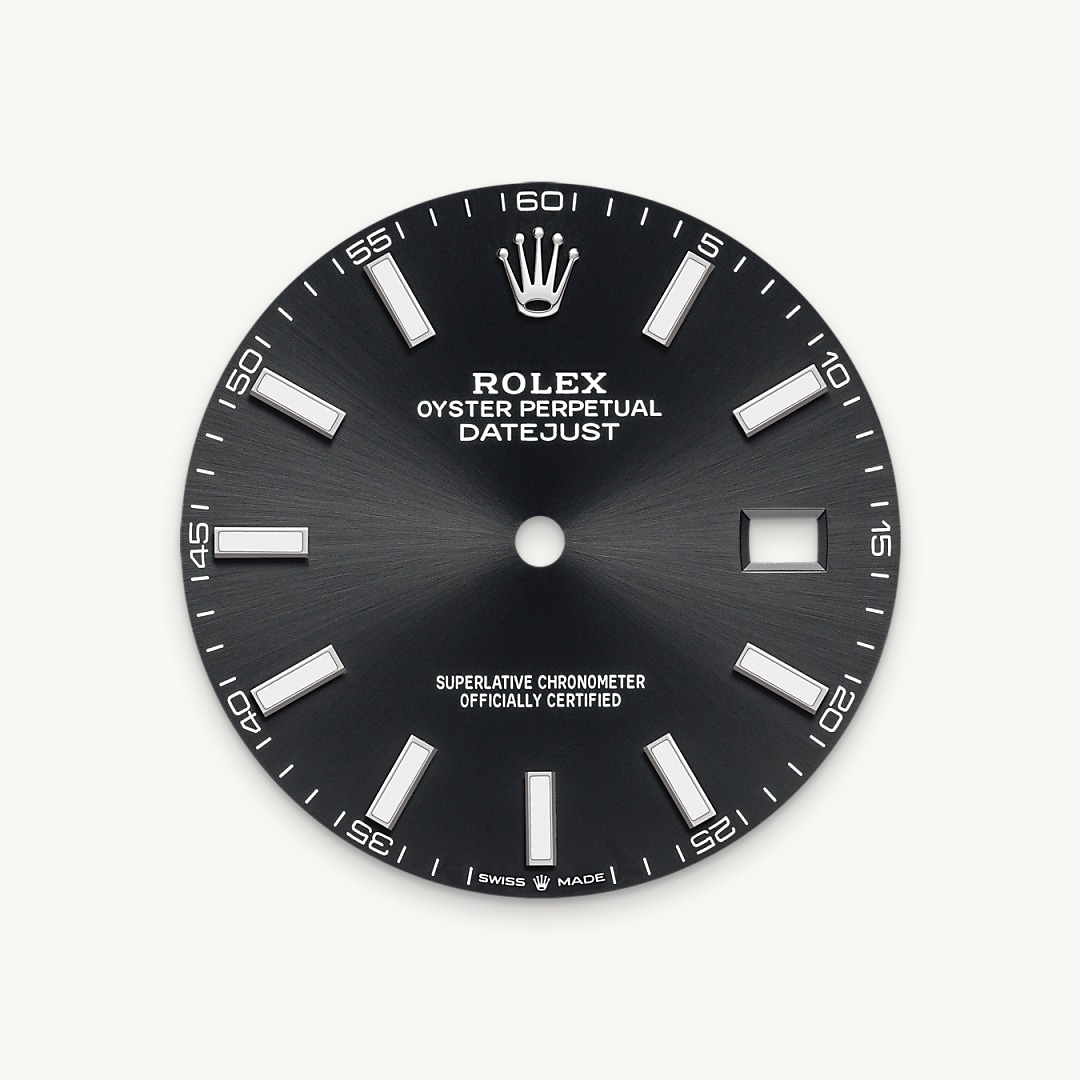 The sunray finish creates delicate light reflections on many dials in the Oyster Perpetual collection. It is obtained using masterful brushing techniques that create grooves running outwards from the centre of the dial. Light is diffused consistently along each engraving, creating a characteristic subtle glow that moves depending on the position of the wrist. Once the sunray finish has been completed, the dial colour is applied using Physical Vapour Deposition or electroplating. A light coat of varnish gives the dial its final look.