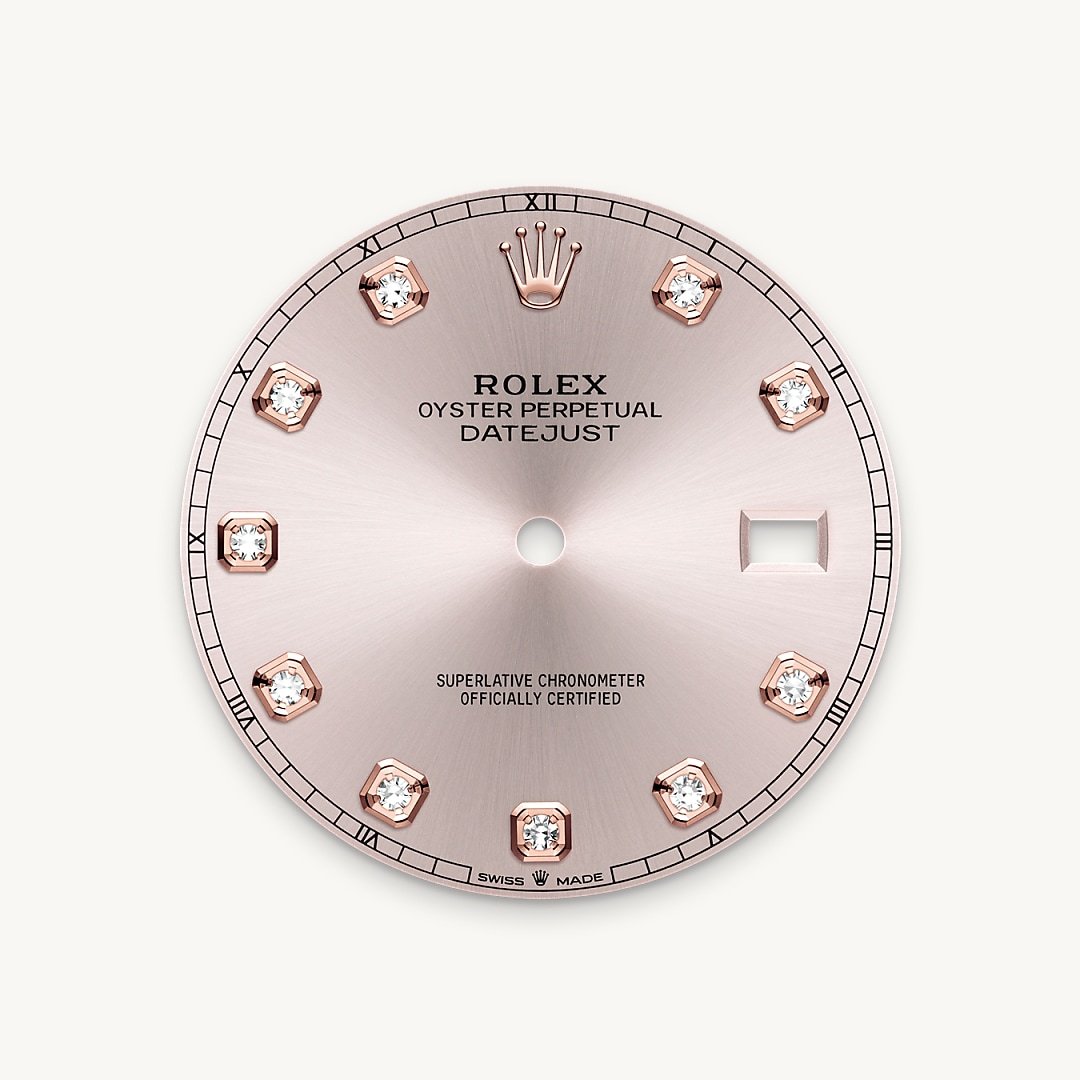 This dial features diamonds in 18 ct gold settings. The sunray finish creates delicate light reflections on many dials in the Oyster Perpetual collection. It is obtained using masterful brushing techniques that create grooves running outwards from the centre of the dial. Light is diffused consistently along each engraving, creating a characteristic subtle glow that moves depending on the position of the wrist. Once the sunray finish has been completed, the dial colour is applied using Physical Vapour Deposition or electroplating. A light coat of varnish gives the dial its final look.
