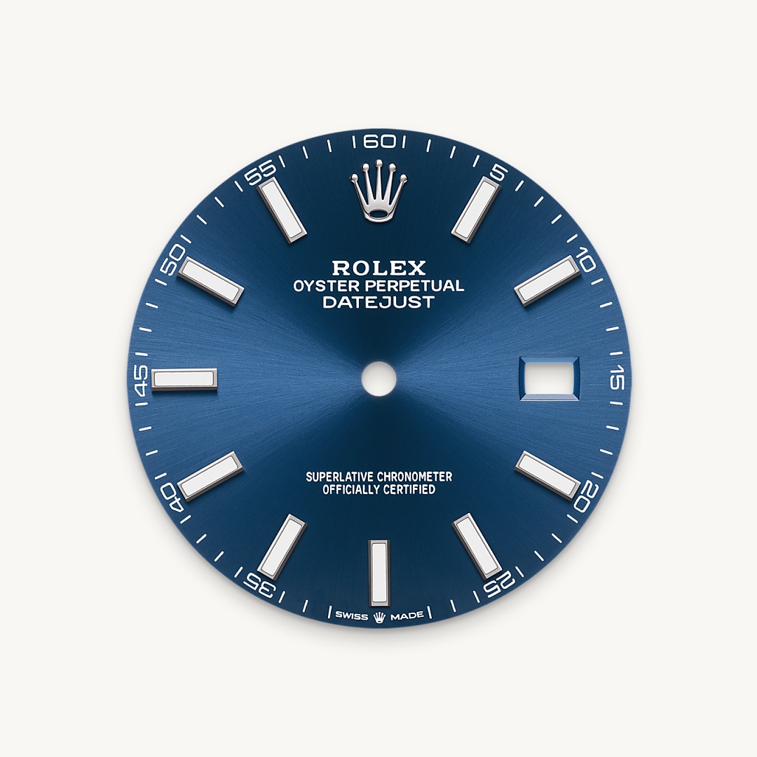 The sunray finish creates delicate light reflections on many dials in the Oyster Perpetual collection. It is obtained using masterful brushing techniques that create grooves running outwards from the centre of the dial. Light is diffused consistently along each engraving, creating a characteristic subtle glow that moves depending on the position of the wrist. Once the sunray finish has been completed, the dial colour is applied using Physical Vapour Deposition or electroplating. A light coat of varnish gives the dial its final look.