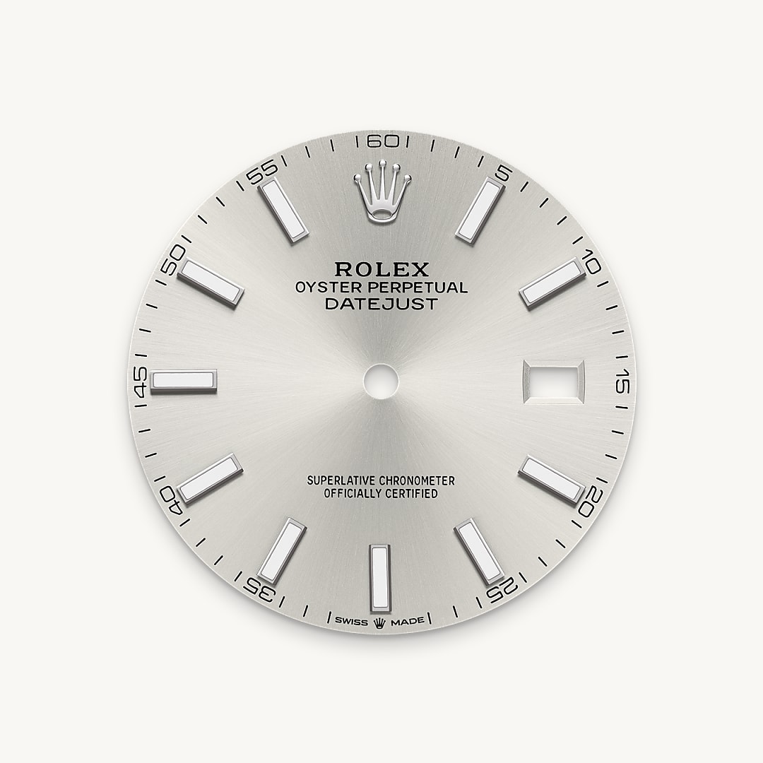 The sunray finish creates delicate light reflections on many dials in the Oyster Perpetual collection. It is obtained using masterful brushing techniques that create grooves running outwards from the centre of the dial. Light is diffused consistently along each engraving, creating a characteristic subtle glow that moves depending on the position of the wrist. Once the sunray finish has been completed, the dial colour is applied using Physical Vapour Deposition or electroplating. A light coat of varnish gives the dial its final look.