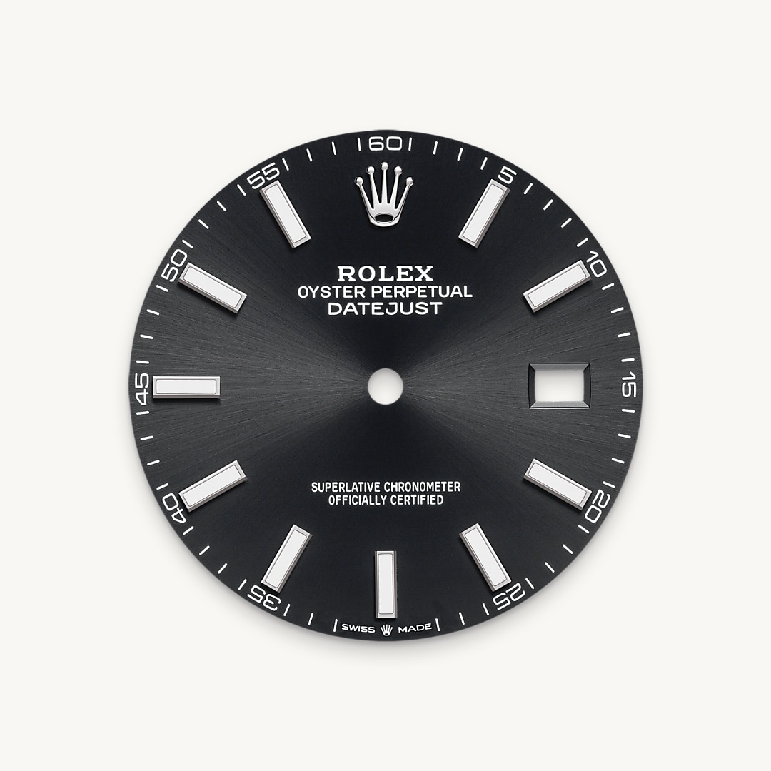 The sunray finish creates delicate light reflections on many dials in the Oyster Perpetual collection. It is obtained using masterful brushing techniques that create grooves running outwards from the centre of the dial. Light is diffused consistently along each engraving, creating a characteristic subtle glow that moves depending on the position of the wrist. Once the sunray finish has been completed, the dial colour is applied using Physical Vapour Deposition or electroplating. A light coat of varnish gives the dial its final look.