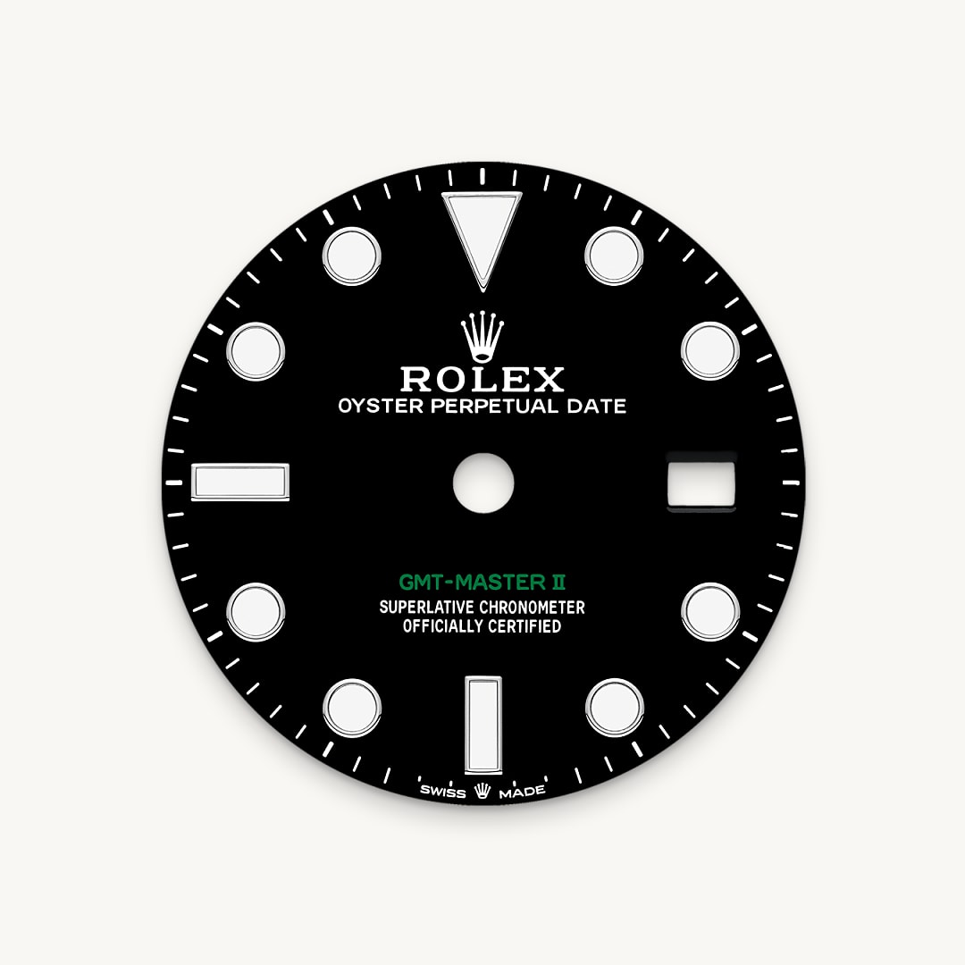 The black lacquer dial bears the inscription ‘GMT-Master II’ in green. This colour also features on the 24-hour hand.
Like all Rolex Professional watches, the GMT-Master II offers exceptional legibility in all circumstances, and especially in the dark, thanks to its Chromalight display. The broad hands and hour markers in simple shapes – triangles, circles, rectangles – are filled with a luminescent material emitting a long-lasting glow.