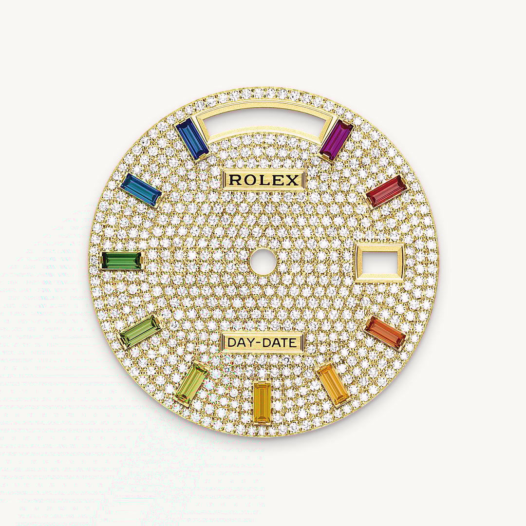 This dial features 10 baguette-cut, rainbow-coloured sapphires. Diamonds, sapphires, rubies, emeralds – the noblest and most precious stones are selected to grace Rolex timepieces. The brand has in-house expertise and equipment enabling it to bejewel any model in its catalogue. Experienced gemmologists first select gemstones of the highest quality. For this, they can rely on their own seasoned judgement as well as state-of-the-art analysis equipment. The stones are then entrusted to the gem-setters, who skilfully place each precious stone onto the watch by hand, one by one, assuring precision to within hundredths of a millimetre. Such stringent tolerances guarantee that each stone shines with optimal brilliance and is perfectly aligned with those around it. These time-honoured gestures, which may be repeated many hundreds of times, ensure that each gem-set watch produced by Rolex sparkles with exceptional intensity and reflects the standard of excellence required by the brand.