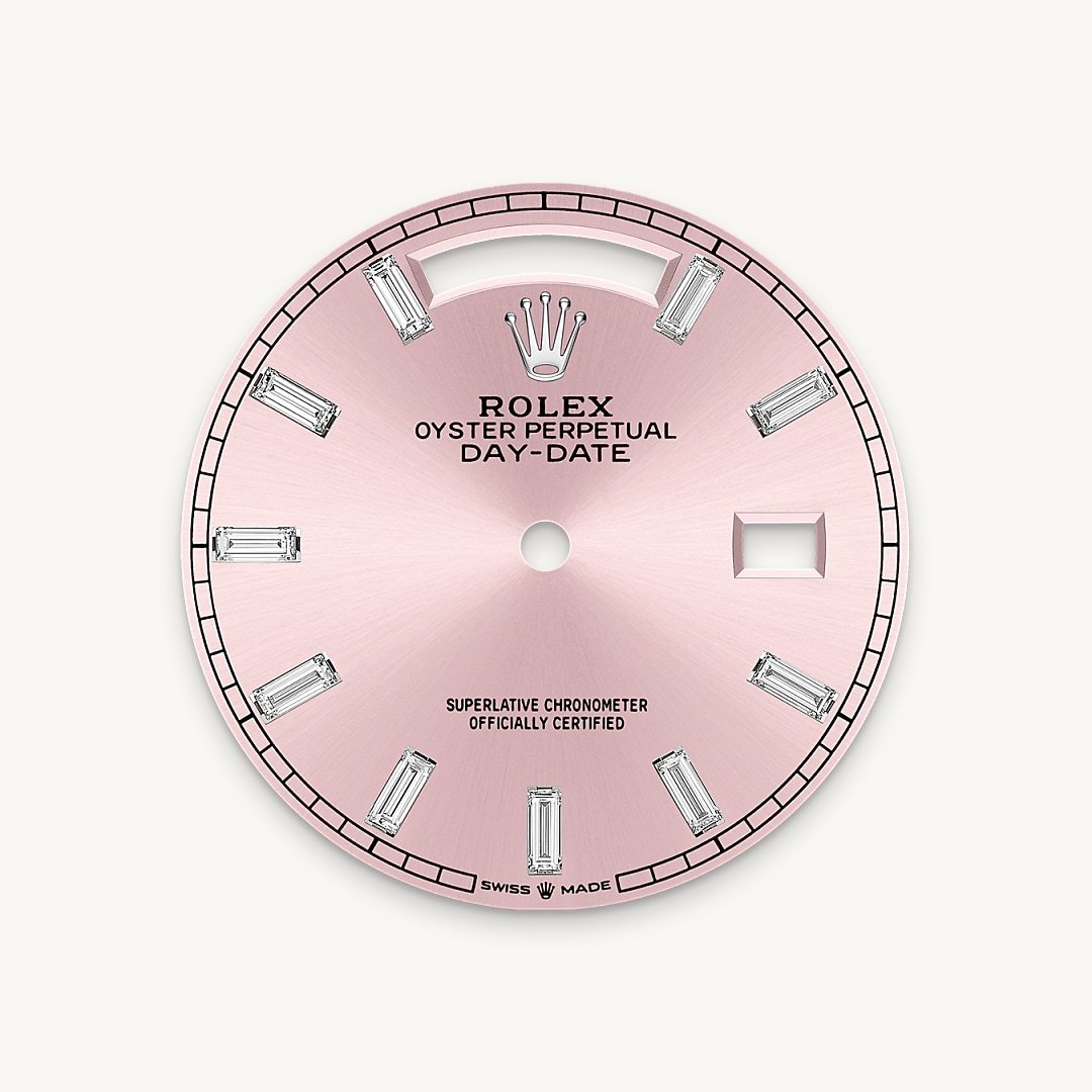 This dial features 10 baguette-cut diamonds. The sunray finish creates delicate light reflections on many dials in the Oyster Perpetual collection. It is obtained using masterful brushing techniques that create grooves running outwards from the centre of the dial. Light is diffused consistently along each engraving, creating a characteristic subtle glow that moves depending on the position of the wrist. Once the sunray finish has been completed, the dial colour is applied using Physical Vapour Deposition or electroplating. A light coat of varnish gives the dial its final look.
