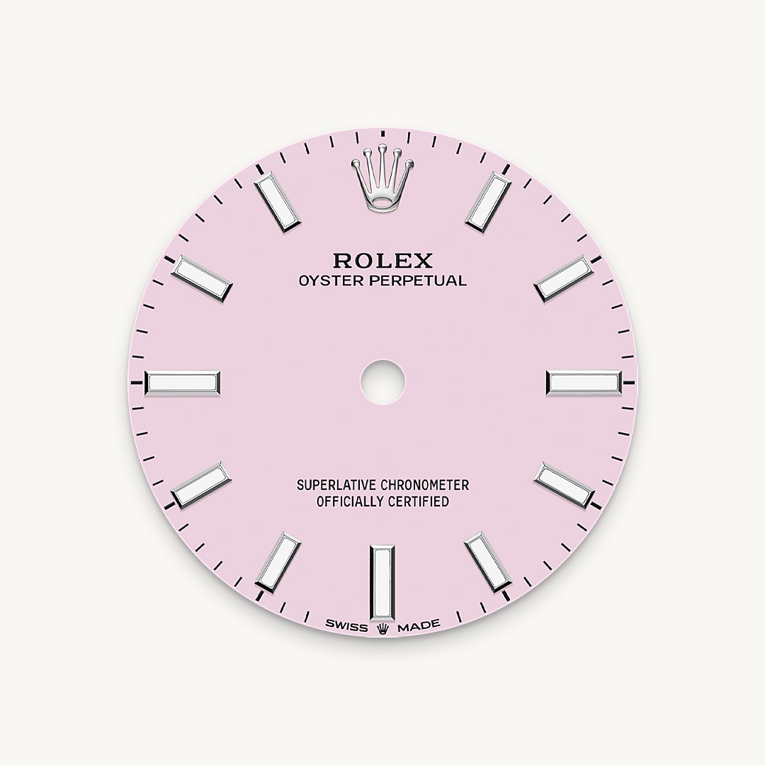 The colours created for the Oyster Perpetual range start life as a lacquer, which must be meticulously applied in a controlled-atmosphere environment to avoid dust and other contamination. The brass plate of the dial base receives layer upon layer of lacquer, six in all, to form a regular, uniform surface. The last step is varnishing and polishing to bring out the full brilliance and depth of colour. The various inscriptions are then pad printed, and the hour markers and crown riveted by hand. The dial, gleaming in its perfection, is all set to take its place on top of the movement at the watch assembly phase.