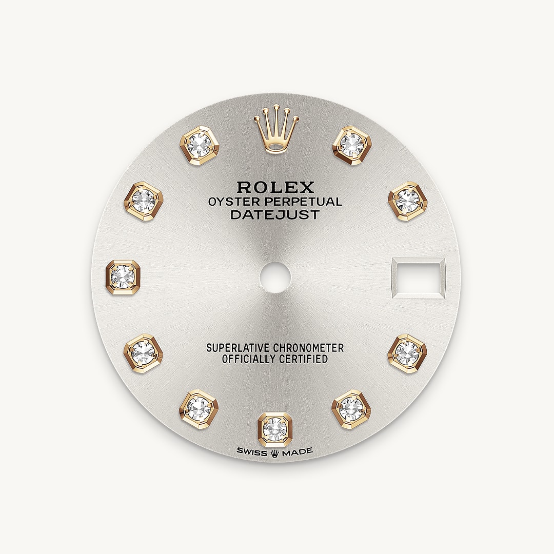 This dial features diamonds in 18 ct gold settings. The sunray finish creates delicate light reflections on many dials in the Oyster Perpetual collection. It is obtained using masterful brushing techniques that create grooves running outwards from the centre of the dial. Light is diffused consistently along each engraving, creating a characteristic subtle glow that moves depending on the position of the wrist. Once the sunray finish has been completed, the dial colour is applied using Physical Vapour Deposition or electroplating. A light coat of varnish gives the dial its final look.