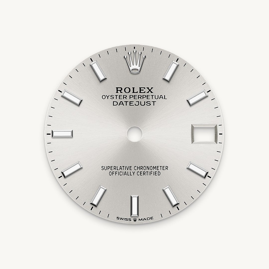 The sunray finish creates delicate light reflections on many dials in the Oyster Perpetual collection. It is obtained using masterful brushing techniques that create grooves running outwards from the centre of the dial. Light is diffused consistently along each engraving, creating a characteristic subtle glow that moves depending on the position of the wrist. Once the sunray finish has been completed, the dial colour is applied using Physical Vapour Deposition or electroplating. A light coat of varnish gives the dial its final look.