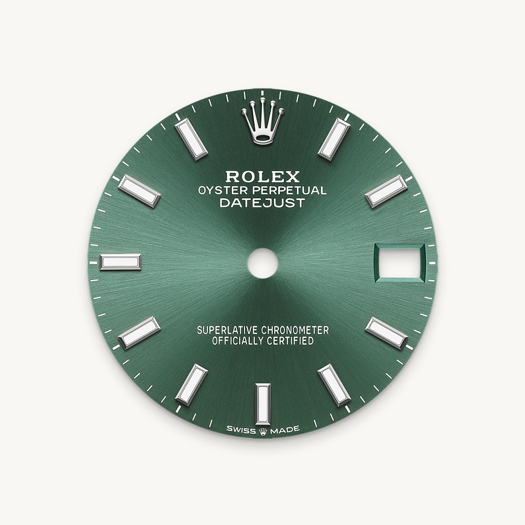The sunray finish creates delicate light reflections on many dials in the Oyster Perpetual collection. It is obtained using masterful brushing techniques that create grooves running outwards from the centre of the dial. Light is diffused consistently along each engraving, creating a characteristic subtle glow that moves depending on the position of the wrist. Once the sunray finish has been completed, the dial colour is applied using Physical Vapour Deposition or electroplating. A light coat of varnish gives the dial its final look.