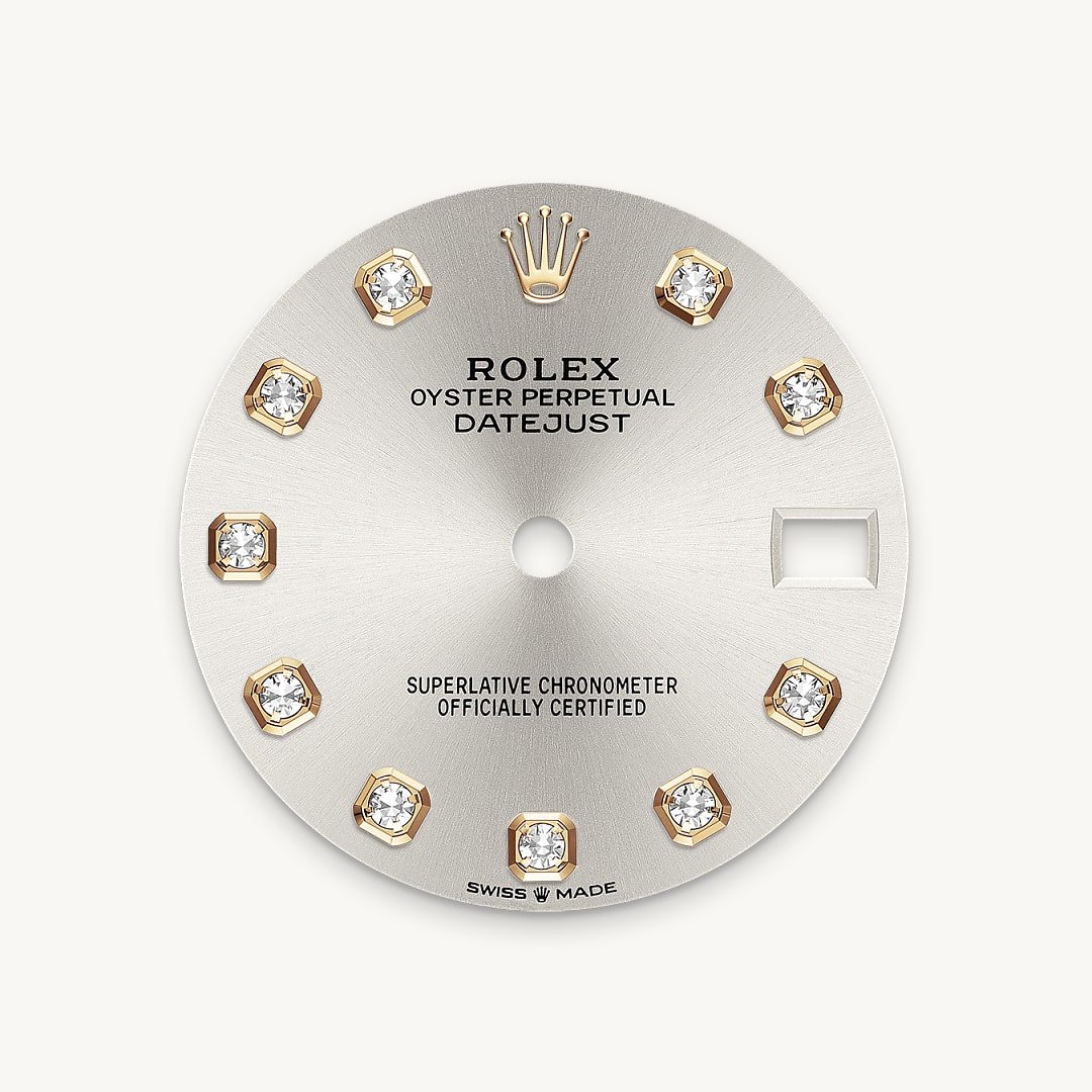 This dial features diamonds in 18 ct gold settings. The sunray finish creates delicate light reflections on many dials in the Oyster Perpetual collection. It is obtained using masterful brushing techniques that create grooves running outwards from the centre of the dial. Light is diffused consistently along each engraving, creating a characteristic subtle glow that moves depending on the position of the wrist. Once the sunray finish has been completed, the dial colour is applied using Physical Vapour Deposition or electroplating. A light coat of varnish gives the dial its final look.