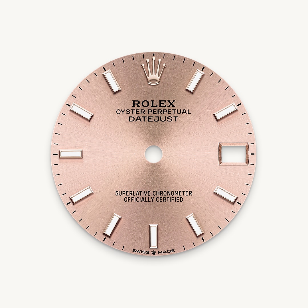 The sunray finish creates delicate light reflections on many dials in the Oyster Perpetual collection. It is obtained using masterful brushing techniques that create grooves running outwards from the centre of the dial. Light is diffused consistently along each engraving, creating a characteristic subtle glow that moves depending on the position of the wrist. Once the sunray finish has been completed, the dial colour is applied using Physical Vapour Deposition or electroplating. A light coat of varnish gives the dial its final look.