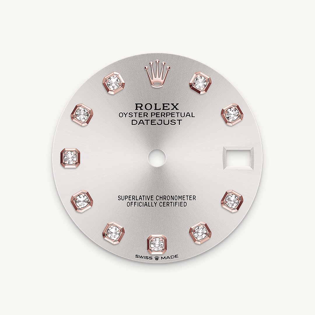 This dial features diamonds in 18 ct gold settings. The sunray finish creates delicate light reflections on many dials in the Oyster Perpetual collection. It is obtained using masterful brushing techniques that create grooves running outwards from the centre of the dial. Light is diffused consistently along each engraving, creating a characteristic subtle glow that moves depending on the position of the wrist. Once the sunray finish has been completed, the dial colour is applied using Physical Vapour Deposition or electroplating. A light coat of varnish gives the dial its final look.