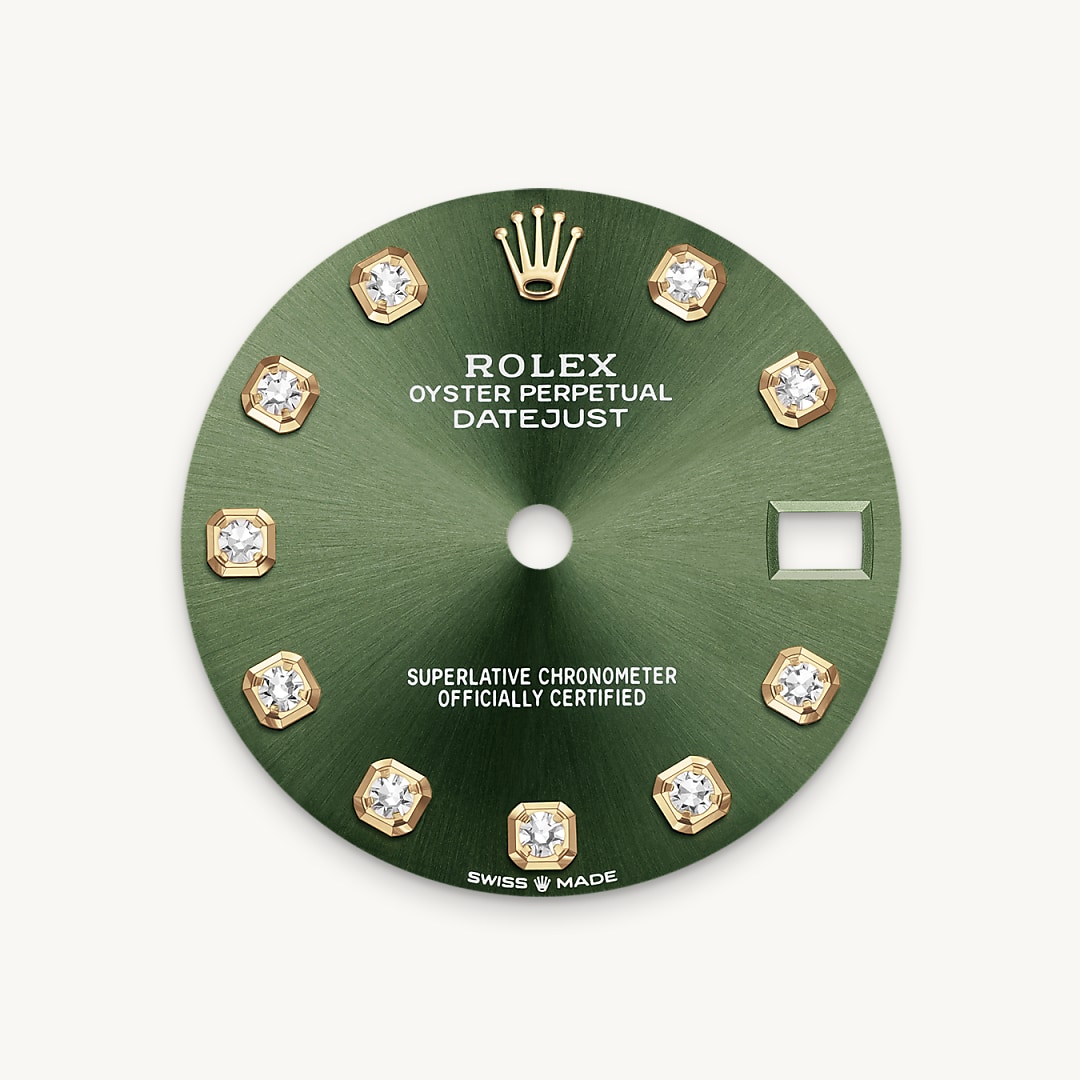 This dial features diamonds in 18 ct gold settings. The sunray finish creates delicate light reflections on many dials in the Oyster Perpetual collection. It is obtained using masterful brushing techniques that create grooves running outwards from the centre of the dial. Light is diffused consistently along each engraving, creating a characteristic subtle glow that moves depending on the position of the wrist. Once the sunray finish has been completed, the dial colour is applied using Physical Vapour Deposition or electroplating. A light coat of varnish gives the dial its final look.