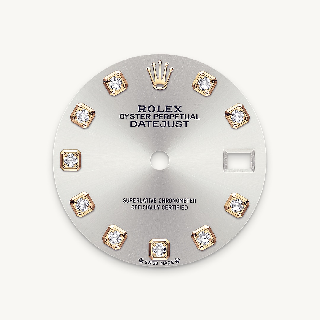 This dial features diamonds in 18 ct gold settings. The sunray finish creates delicate light reflections on many dials in the Oyster Perpetual collection. It is obtained using masterful brushing techniques that create grooves running outwards from the centre of the dial. Light is diffused consistently along each engraving, creating a characteristic subtle glow that moves depending on the position of the wrist. Once the sunray finish has been completed, the dial colour is applied using Physical Vapour Deposition or electroplating. A light coat of varnish gives the dial its final look.