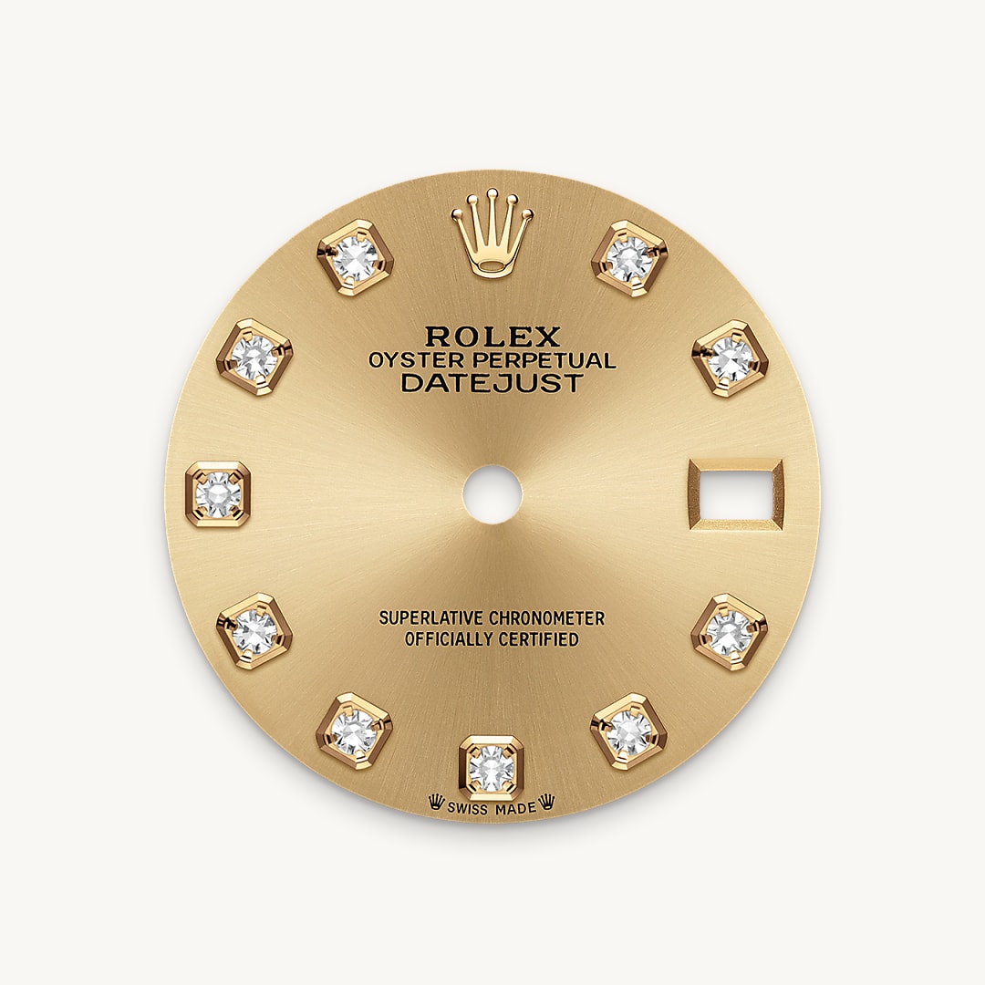 This dial features diamonds in 18 ct gold settings. The sunray finish creates delicate light reflections on many dials in the Oyster Perpetual collection. It is obtained using masterful brushing techniques that create grooves running outwards from the centre of the dial. Light is diffused consistently along each engraving, creating a characteristic subtle glow that moves depending on the position of the wrist. Once the sunray finish has been completed, the dial colour is applied using Physical Vapour Deposition or electroplating. A light coat of varnish gives the dial its final look.