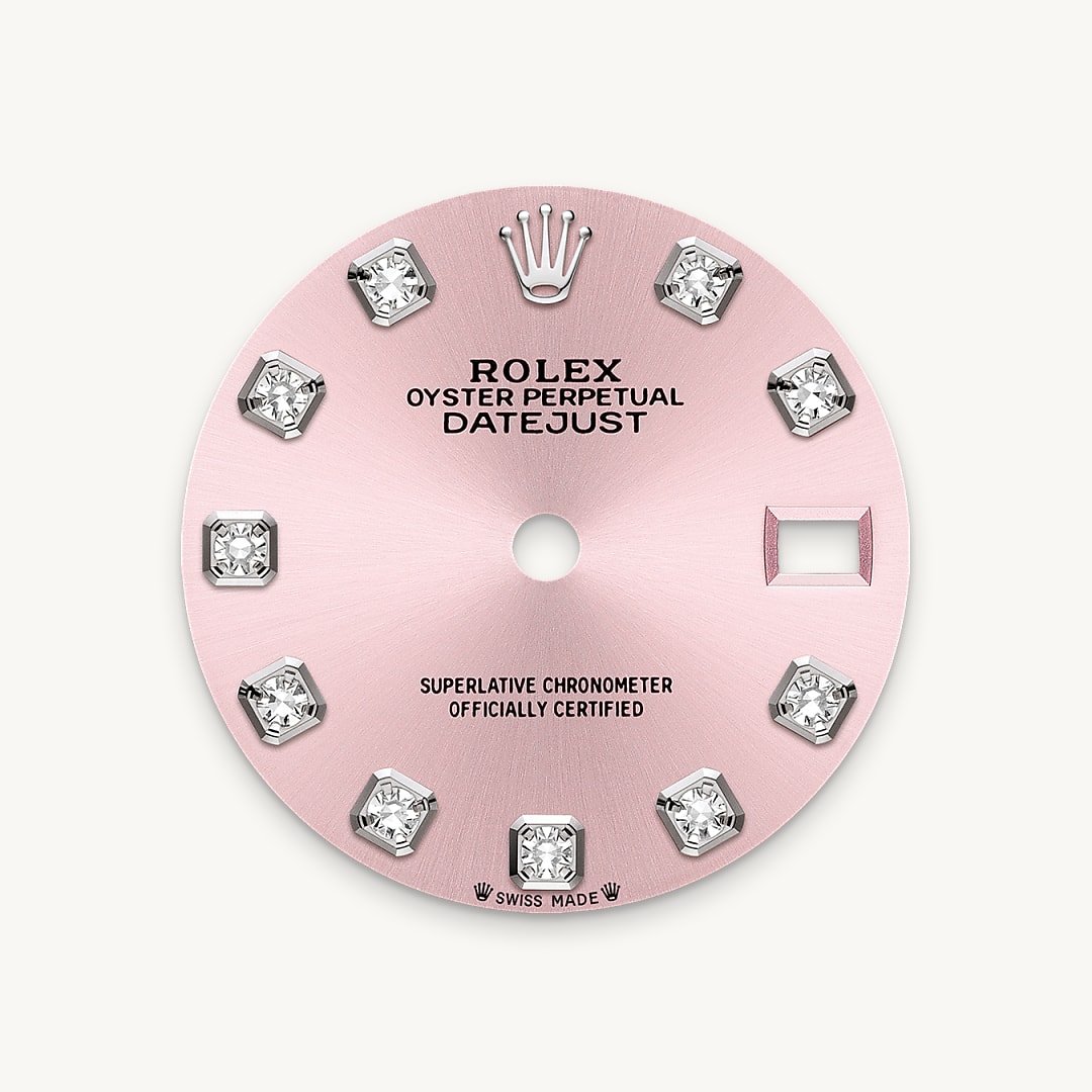 This dial features diamonds in 18 ct gold settings. The sunray finish creates delicate light reflections on many dials in the Oyster Perpetual collection. It is obtained using masterful brushing techniques that create grooves running outwards from the centre of the dial. Light is diffused consistently along each engraving, creating a characteristic subtle glow that moves depending on the position of the wrist. Once the sunray finish has been completed, the dial colour is applied using Physical Vapour Deposition or electroplating. A light coat of varnish gives the dial its final look.