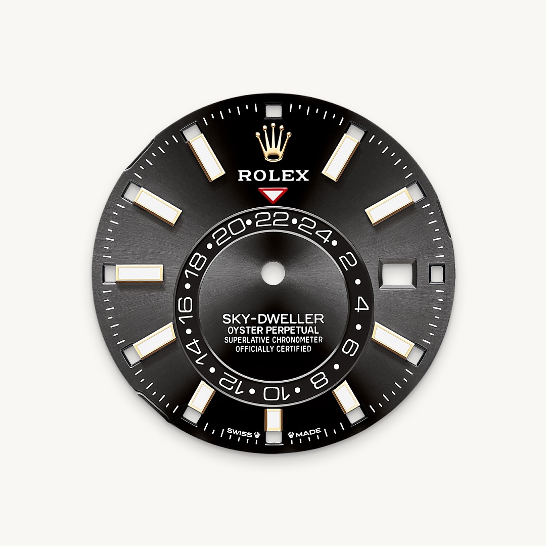 A fixed inverted red triangle on the dial points to the chosen reference time – the time at home or at the traveller’s usual workplace – on the off-centre 24-hour disc. At a glance, this 24-hour display clearly distinguishes daytime hours from night-time hours in the other time zone. The dials now feature rectangular index hour markers and longer hands, as well as a Chromalight display with long-lasting luminescence, which enhances legibility. 
A deep red rectangle in one of the 12 windows around the dial indicates the current month, a striking characteristic of the Saros annual calendar. This ingenious mechanism simplifies life for the wearer of the watch, who no longer needs to think about adjusting the date at the end of a 30-day month. The annual calendar displays the correct date through the year. Only one adjustment is needed – on 1 March (February having only 28 or 29 days). The date is connected to local time and automatically changes according to the traveller’s local time zone.
