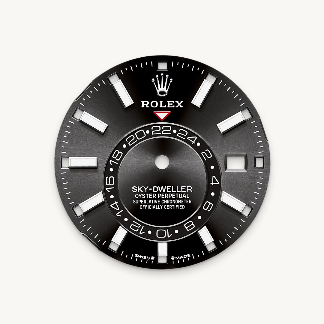 A fixed inverted red triangle on the dial points to the chosen reference time – the time at home or at the traveller’s usual workplace – on the off-centre 24-hour disc. At a glance, this 24-hour display clearly distinguishes daytime hours from night-time hours in the other time zone. The dials now feature rectangular index hour markers and longer hands, as well as a Chromalight display with long-lasting luminescence, which enhances legibility.
A deep red rectangle in one of the 12 windows around the dial indicates the current month, a striking characteristic of the Saros annual calendar. This ingenious mechanism simplifies life for the wearer of the watch, who no longer needs to think about adjusting the date at the end of a 30-day month. The annual calendar displays the correct date through the year. Only one adjustment is needed – on 1 March (February having only 28 or 29 days). The date is connected to local time and automatically changes according to the traveller’s local time zone.