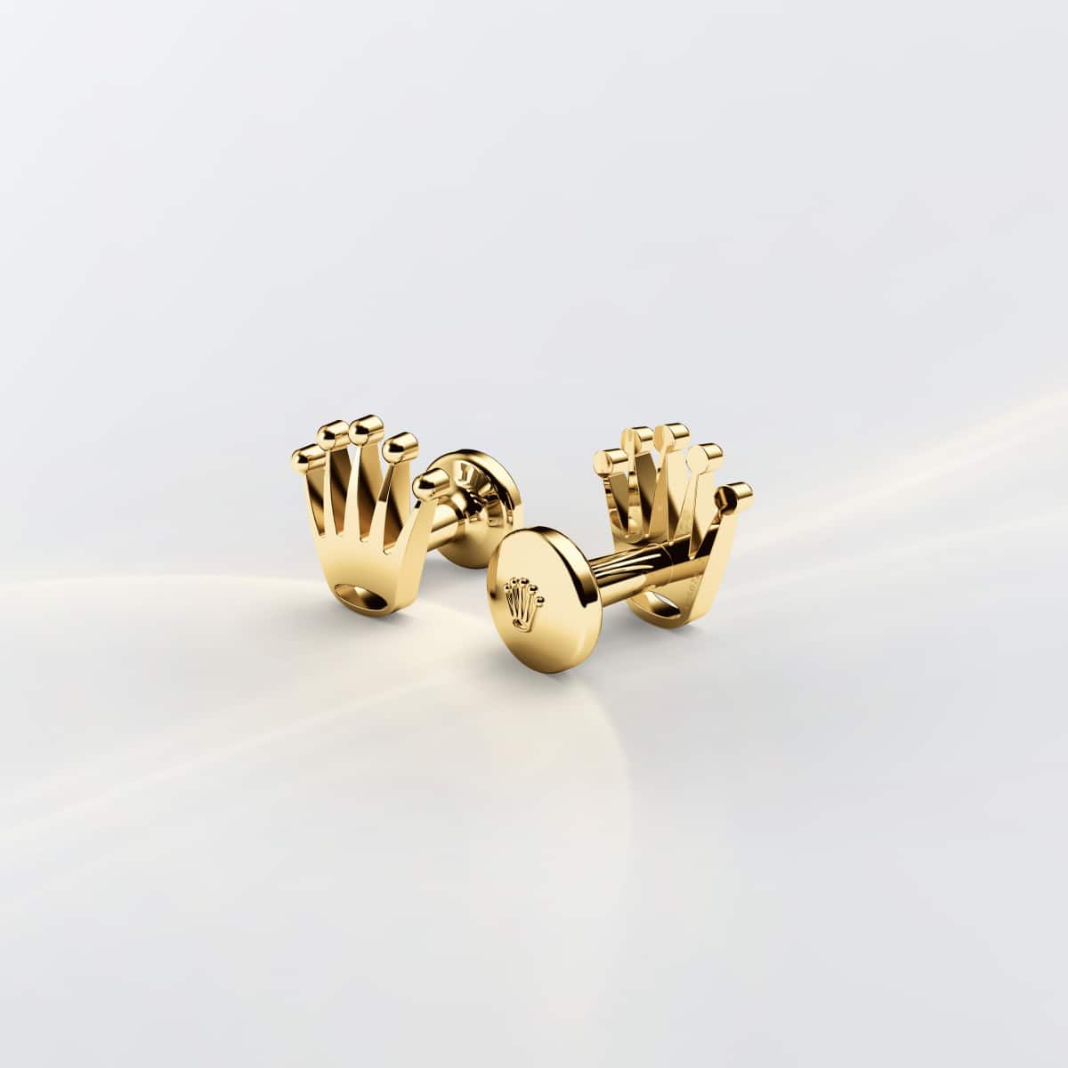 Rolex cufflinks made of 18 ct yellow gold and shaped in the form of the signature Rolex crown.