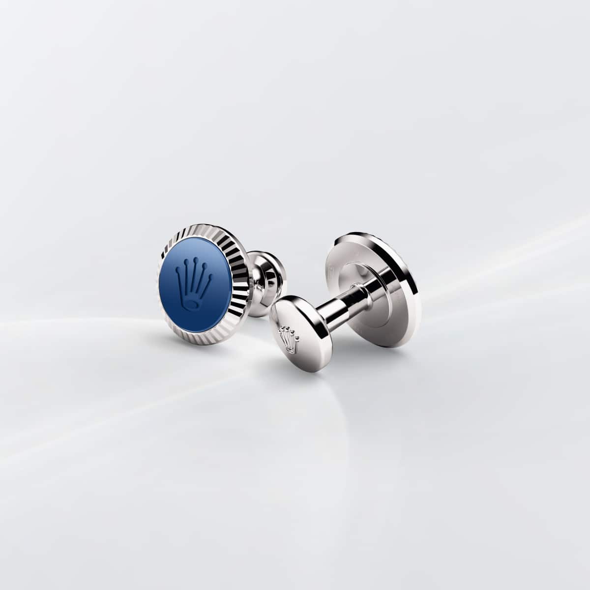 Rolex cufflinks made of 18 ct white gold featuring the signature Rolex fluting, Cerachrom insert and Rolex crown.